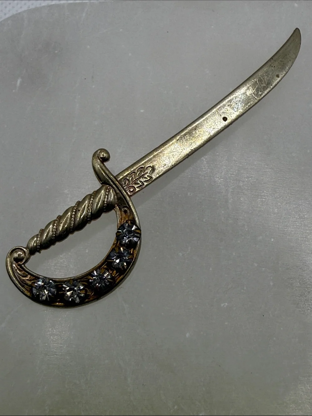 Vintage Rhinestone Sword Letter brooch pin Gold Tone ornate detail distressed